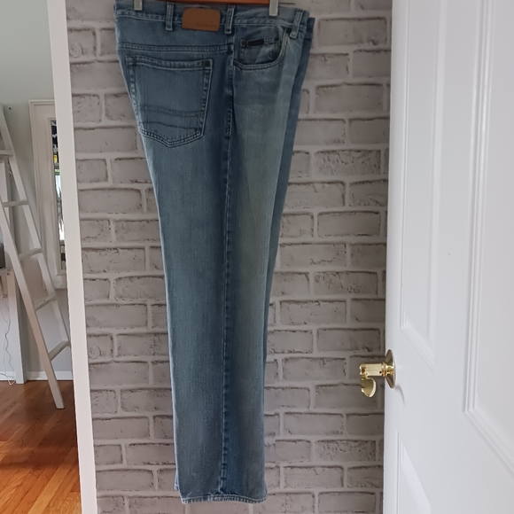 Calvin Klein • Men's Light/Medium Wash Distressed Bootcut Denim Jeans - Picture 6 of 15